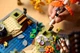 Конструктор LEGO ICONS Осенний коттеджный сад 1102 деталей (11372) - изображение 9
