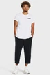 Чоловічі чорні спортивні штани Unstoppable Flc Baggy Crop Under Armour M 1384010-001 - изображение 2