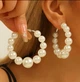 Женские сережки -кольца с каскадными бусинами jewelry Серебристые-белые - изображение 1
