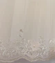 Праздничное платье для девочки к первому причастию с цветочками и вышивкой 130 см молочно-кремовое - изображение 7