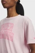 Жіноча рожева футболка Rival OS Campus Tee Under Armour XS 6007883-647 - изображение 3