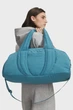Жіноча блакитна спортивна сумка UA Studio Soft Duffle Under Armour OSFM 6009628-466 - изображение 2