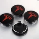 Колпачки на литые диски Tesla 6005879-00-A 57 мм 50 мм черные красные заглушки в диски тесла - изображение 1