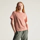 Жіноча футболка adidas by Stella McCartney TrueCasuals Regular Sportswear adidas JX6776 (XL) рожевий (4068807643369) - зображення 1