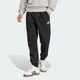 Мужские джоггеры Essentials Feelcozy Fleece adidas JE3815 (XS) черный (4067905006373) - изображение 1