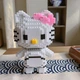 3D-конструктор из наноблоков Hello Kitty в костюме белого тигра с розовым бантом - изображение 4
