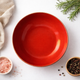 Тарілка глибока Porland Red 210 мм порцелянова червона для супу та сервірування 197621/R - зображення 1