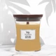 Ароматическая свеча с ароматом инжира и гваякового дерева Woodwick Medium Gilded Sands 275 г - изображение 1