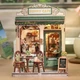 Игрушечный конструктор-румбокс DIY Booknook Солнечная Кофейня (Sunny Cafe) с LED-подсветкой - изображение 2