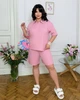 Костюм-двойка женский из трикотажа в рубчик с верхом поло свободного кроя и шортами летний G&M k-130281 52-54 Размер цвет розовый - изображение 1