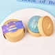 Іграшка 5 см. блискучі сквіш пельмень Dumpling різні кольори - зображення 1