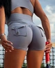 Спортивні жіночі шорти pocket з кишенями бразильський PUSH UP для фітнесу та pole dance L Блідо-блакитні (XT03_pocketL) - зображення 2