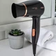 Фен ROTEX RFF-B Voyage Compact з концентратором 1200 Вт 2 швидкості складна ручка чорний (ZZI) - зображення 1