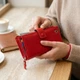 Женский вертикальный кошелек из натуральной кожи на хлястике с кнопкой ST Leather Красный (bg192fash81) - изображение 2