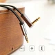 Аудіокабель UGREEN AV119 3.5mm Male to 3.5mm Male Straight to angle flat сable 2m Black (UGR-10599) - зображення 3