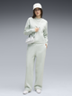 Спортивний костюм жіночий Puma Tracksuits 69399529 XL Creme De Mint (4070033548431) - зображення 1