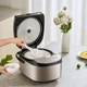 Рисоварка Midea, внутренняя кастрюля из черного фарфора объемом 4 л со съемной крышкой, функция Smart Reservation на 24 часа, для приготовления сладкого риса, MB-AFB4027R [серия ZMD Peace of Mind] - изображение 5