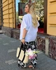 Костюм женский двойка с блузой свободного кроя и широкими брюками с цветочным принтом из софта G&M k-131236 50-52 Размер цвет белый - изображение 2