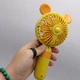 Вентилятор портативний MIC з підставкою для телефона 3,7 V акумуляторний 2 режими охолодження Жовтий для дому та офісу з USB-зарядкою - зображення 2