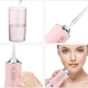 Іригатор для чищення зубів та порожнини рота Oral Irrigator з акумулятором та змінними насадками Pink - зображення 2