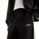 Чоловічі чорні спортивні брюки New Balance Trackside Woven 54 (XXL) (MB62A8LTBK) - зображення 4