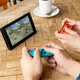 Портативна ігрова консоль Nintendo Switch with Neon Blue та Neon Red Joy-Con (045496452629) - зображення 9