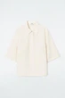 Футболка поло жіноча COS minimal cotton polo shirt 1238205002 XS Бежевий - изображение 6