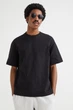 Футболка з бавовни Loose fit H&M 608945002c68 S чорна (100014427) - зображення 1