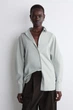 Сорочка жіноча COS rounded pima cotton shirt 1290607005 Eur 38 Світлий зелений - изображение 2