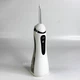 Ирригатор для полости рта 200 мл портативный аккумуляторный с 4 насадками Oral Irrigator, беспроводной с 3 режимами работы для ухода за зубами, деснами и брекетами Белый, AND-1-37-White - изображение 12