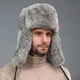 Шапка вушанка з кролика сіра 60 р - изображение 1