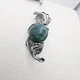 Серебряная брошка с малахитом "Мелодия" 8,7 г - изображение 3