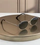 Солнцезащитные очки Ray-Ban RB3774D серебро, темная серо-зеленая линза, овальные, унисекс, - изображение 1