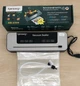 Вакууматор для продуктов Rainberg RB-2335 Черный (Бытовой вакуумный упаковщик для продуктов и соответствий со сварочной планкой и пакетами в комплекте) - изображение 1