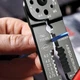 Клещи для опрессовки, резки и зачистки 230мм KNIPEX 97 21 215 SB, фосфатированные - изображение 3