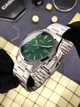 Мужские наручные часы Casio MTP-VD03D-3A1 серебристые с зеленым циферблатом - изображение 1