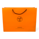 Пакет Hermes 42х14х30 см из плотной бумаги, оранжевый фирменный пакет с черными веревочными ручками - изображение 1