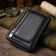 Кожаный женский кошелек на молнии с металлическим логотипом производителя ST Leather 19483 черный. - изображение 4