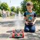 Трюковая машинка-перевертыш с двумя пультами управления для детей красная с аккумулятором для активных игр 28х13,5х8 см - изображение 10