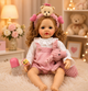 Реалістична лялька реборн Reborn Baby Doll Liana 55 см – дівчинка з кучерявим світлим волоссям та аксесуарами, можна купати (RB099) - зображення 2