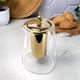 Стеклянный чайник-кофейник для плиты 1,1л Jasmine GK-5802 с золотистыми элементами и удобным заварочным фильтром Прозрачный - изображение 3