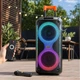 Колонка портативная акустическая Bluetooth с беспроводным микрофоном, пультом и подсветкой RGB, аккумуляторная аудиосистема 2×8 дюймов с телескопической ручкой и колесами для дома и отдыха на природе, TTD-2821 - изображение 1
