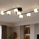 Потолочная LED люстра на пульте 118W с 7 белыми стеклянными шарами 3000-6500K черно-золотой каркас Svet SY-77232/7T BK+FGD - изображение 1