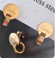 Сережки - гвоздики Cartier в золотому кольорі - зображення 3
