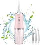 Іригатор ротової порожнини Oral Irrigator з 3 режимами, тиском 275–780 кПа, акумулятором 1500 мАг, IPX7, 2 насадками та контейнером 200 мл рожевий - изображение 2