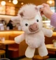 Мягкая плюшевая игрушка Бегающая теленка Running Cow Plush с подвижными лапками, коровка, бычок бегает 45 см Цвет розовый - изображение 1