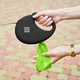 Повідець-рулетка для собак WAUDOG R-leash з контейнером для пакетів, світловідбивна стрічка, L, до 40 кг, 5 м, чорний - зображення 4