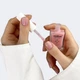 RESULTUM Nail Polish Hardener S.O.S + Shea Butter Зміцнювач рожевий, 11 мл - изображение 2