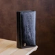 Женский кошелек ST Leather из натуральной кожи черный большой горизонтальный с монетницей для карт на кнопке 17 5х9х3 5 см 56518 - изображение 6