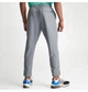 Брюки чоловічі Nike Dri-Fit Unlimited Tapered Leg Versatile Training Pants Grey S Сірий FB7548-084 - зображення 5